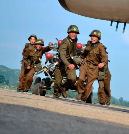 http://www.worldmeets.us/images/north-korea-missile-team_pic.png