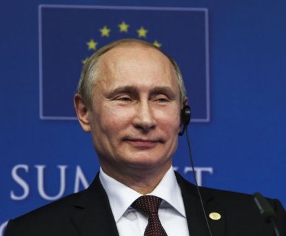 http://www.worldmeets.us/images/putin-grin-power-play-poland_pic.jpg